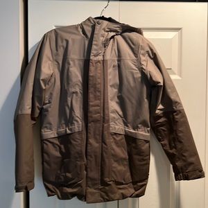 REI kids large coat. Tan. Good condition.